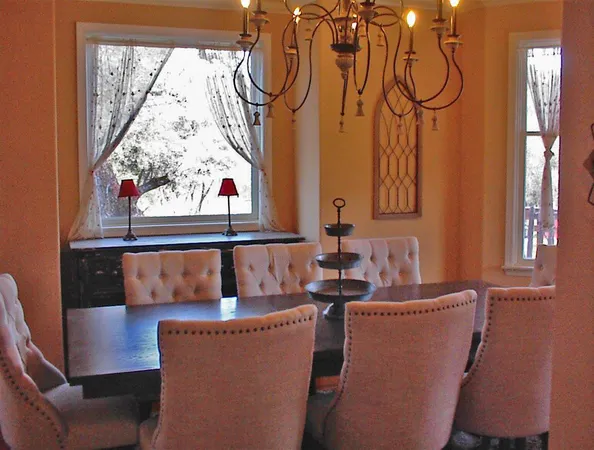 a view of livingroom with furniture and floor to ceiling window