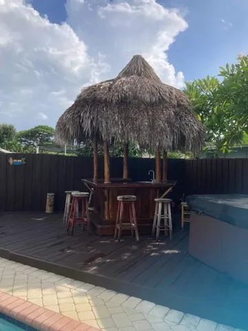 a view of a terrace with furniture