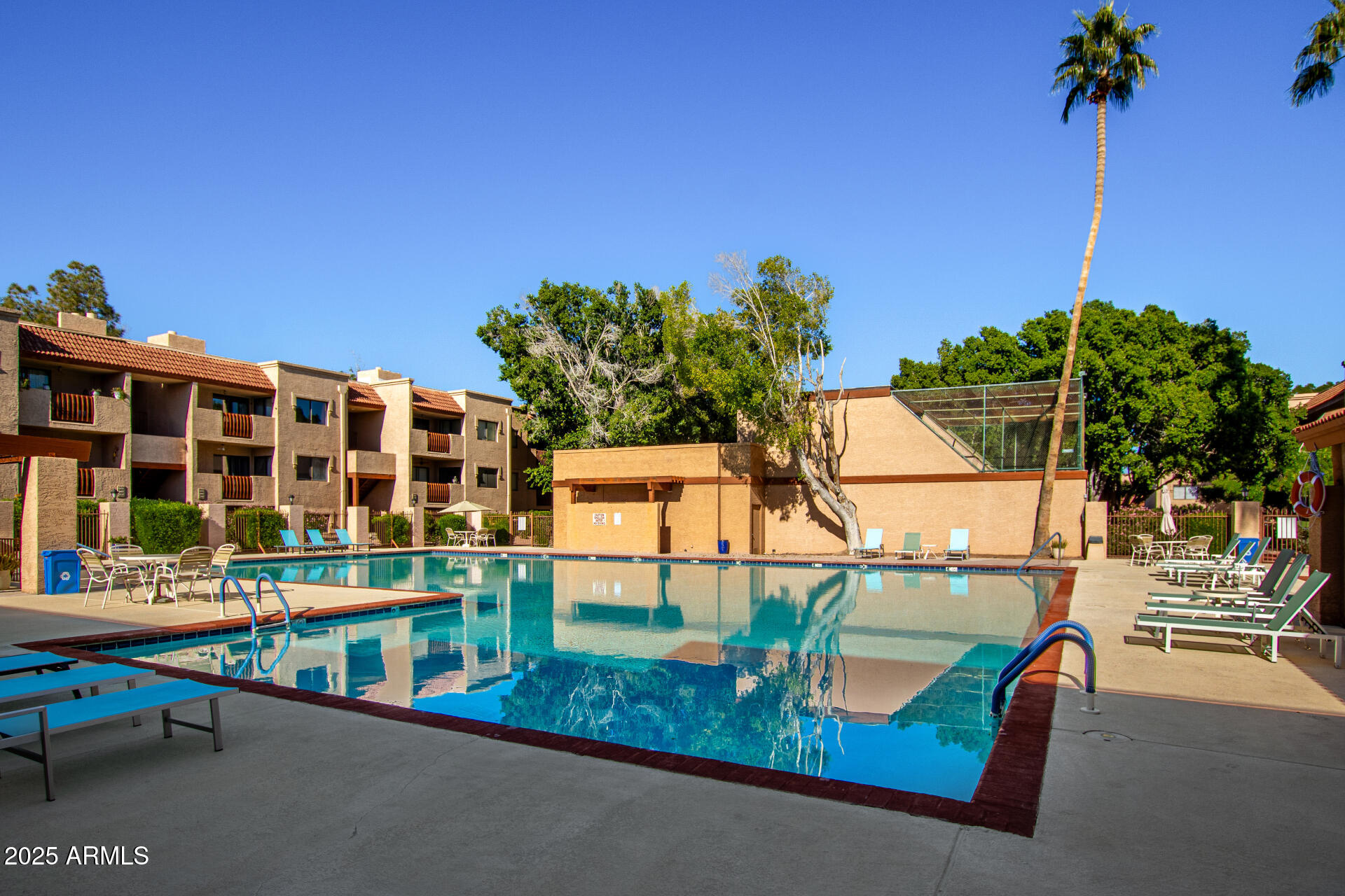 3031 North Civic Center Plaza, Unit 229 Scottsdale, AZ 85251 - Photo 17 of 20 a view of swimming pool with outdoor seating and city view