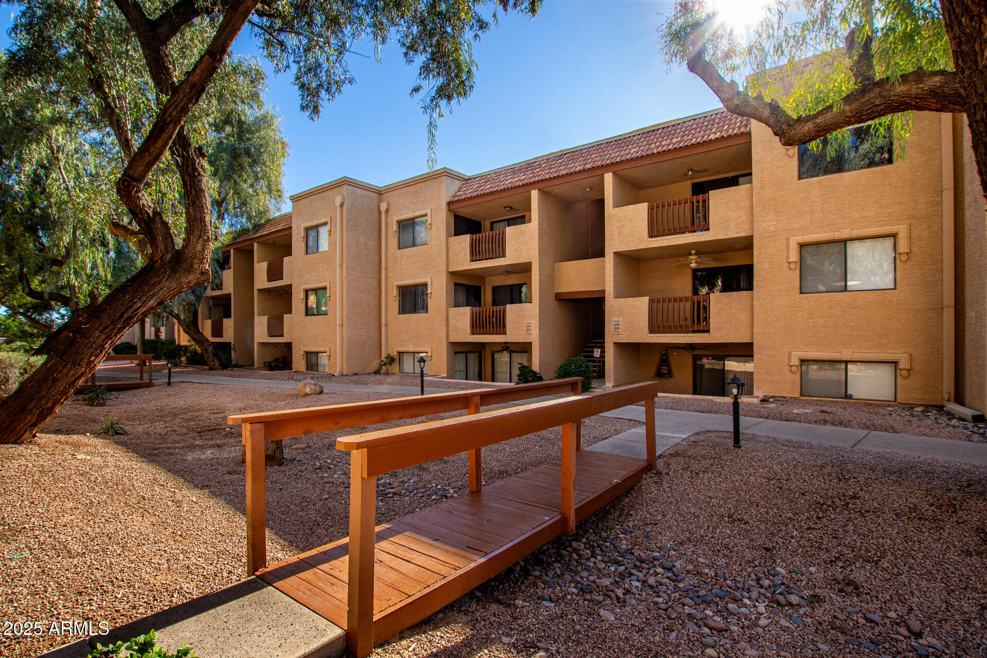 3031 North Civic Center Plaza, Unit 229 Scottsdale, AZ 85251 - Photo 2 of 20 a view of building with outdoor space