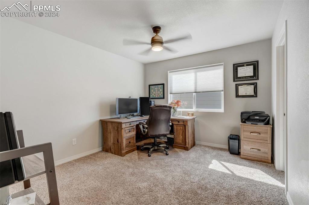 11305 Avena Road Peyton, CO 80831 - Photo 34 of 47 a workspace with furniture and window