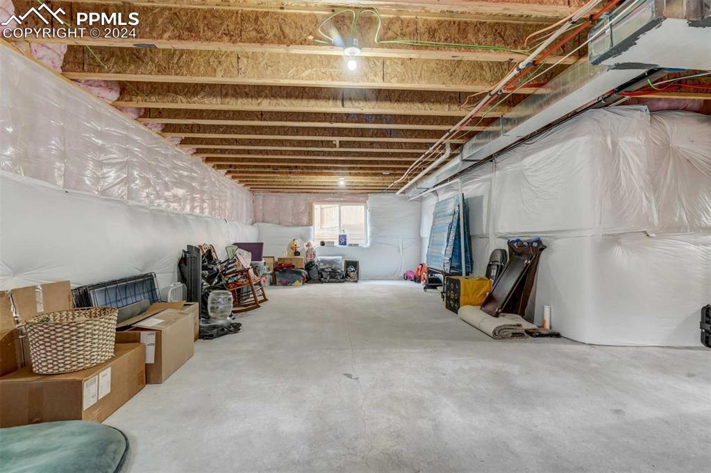 11305 Avena Road Peyton, CO 80831 - Photo 41 of 47 a view of a room with gym equipment