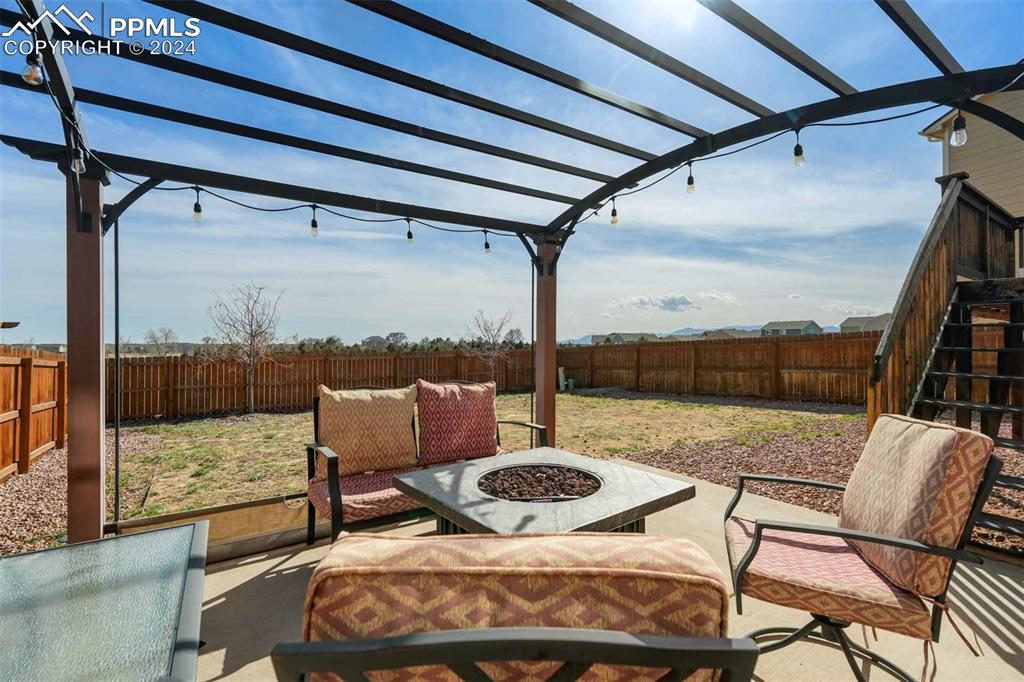 11305 Avena Road Peyton, CO 80831 - Photo 44 of 47 a view of an outdoor sitting area