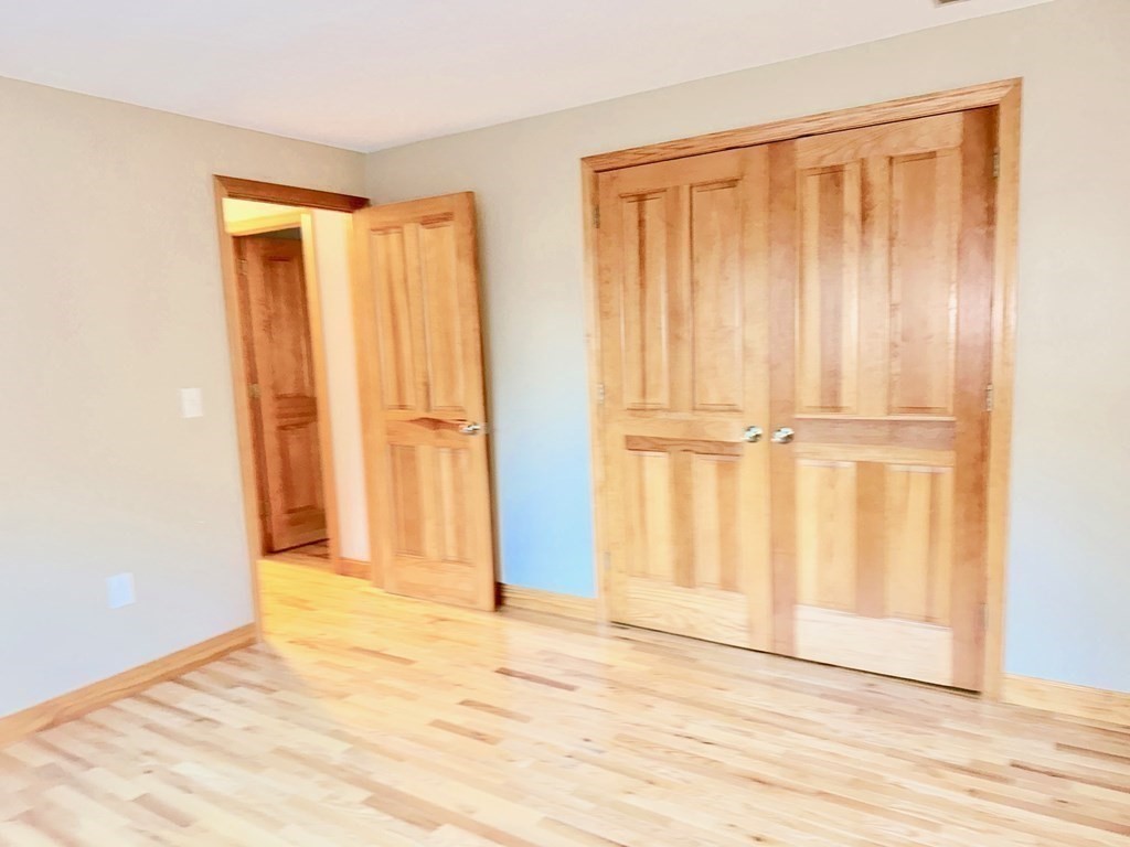 101 Minechoag Heights, Unit 101 Ludlow, MA 01056 - Photo 13 of 20 an empty room with window