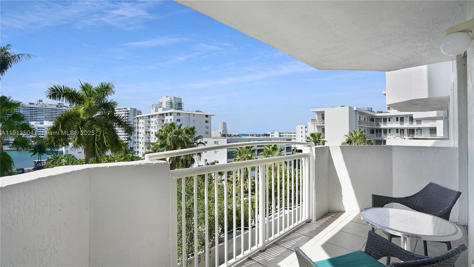 1621 Bay Road, Unit 606 Miami Beach, FL 33139 - Photo 7 of 32 a balcony with an outdoor space