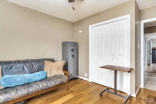 a living room with furniture and a couch