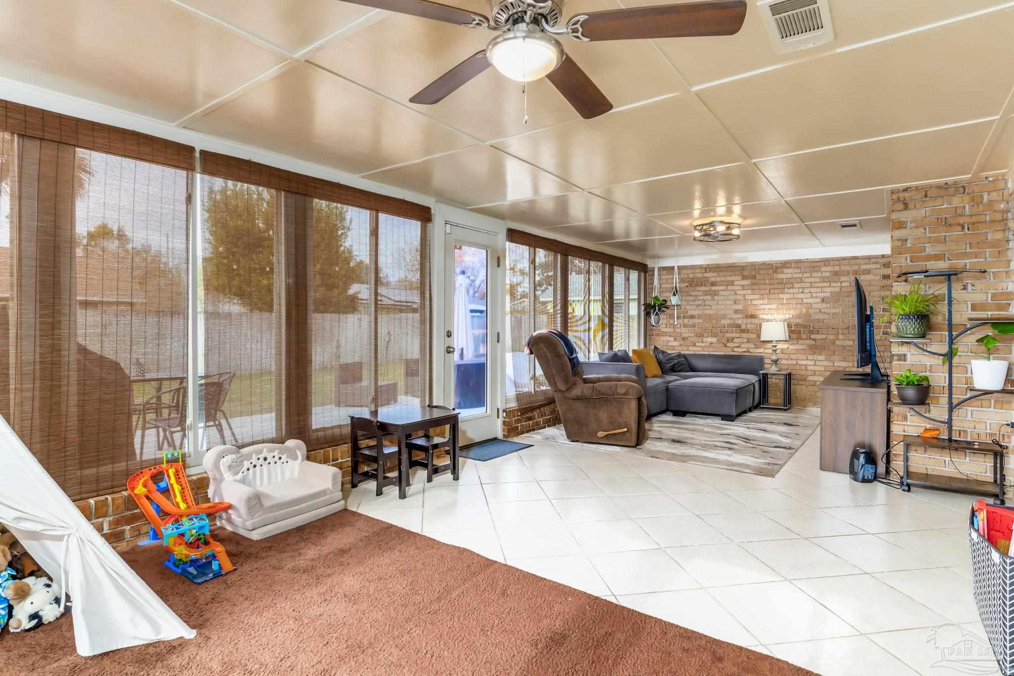 3525 Hopestill Road Pensacola, FL 32503 - Photo 17 of 20 a living room with furniture and a large window