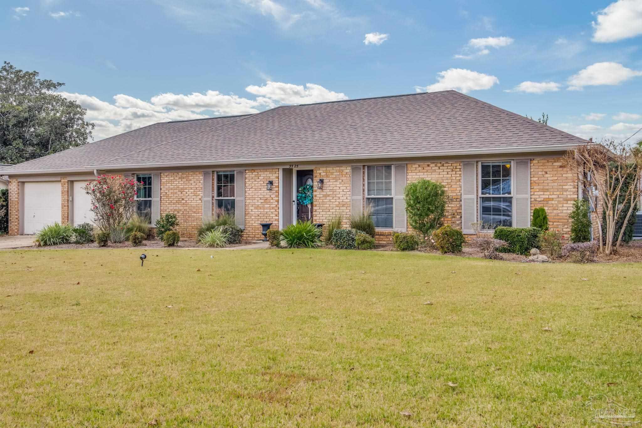 3525 Hopestill Road Pensacola, FL 32503 - Photo 3 of 20 a front view of house with an outdoor space and seating