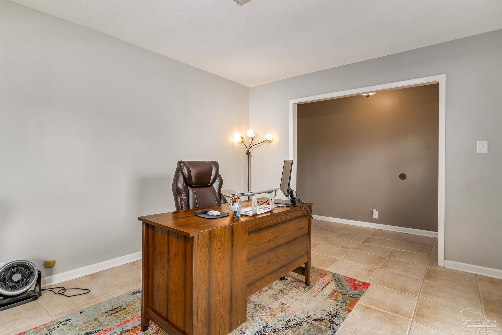 3525 Hopestill Road Pensacola, FL 32503 - Photo 4 of 20 a room with storage and utility