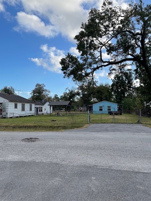 7339 Lewiston Street Houston, TX 77049 - Photo 1 of 23 a view of a fountain in front of a house