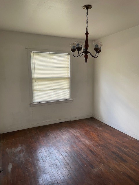 7339 Lewiston Street Houston, TX 77049 - Photo 13 of 23 a view of a room with wooden floor air conditioner and windows