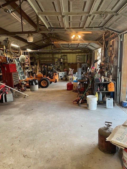 7339 Lewiston Street Houston, TX 77049 - Photo 21 of 23 a view of a garage with a bike and car
