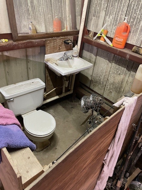 7339 Lewiston Street Houston, TX 77049 - Photo 23 of 23 a bathroom with a sink and a toilet