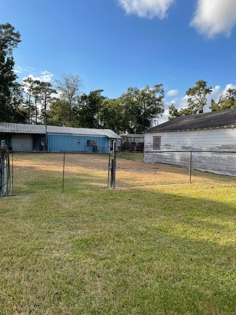 7339 Lewiston Street Houston, TX 77049 - Photo 6 of 23 a view of a swimming pool with an outdoor seating and a garden
