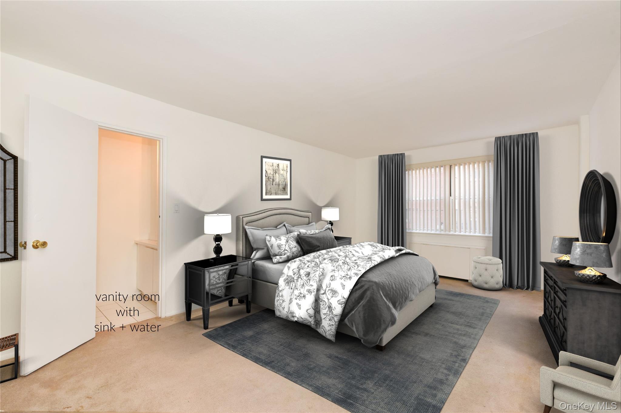 180 South Middle Neck Road, Unit 2A Great Neck, NY 11021 - Photo 6 of 24 a bedroom with a bed a couch and a flat tv screen on a dresser