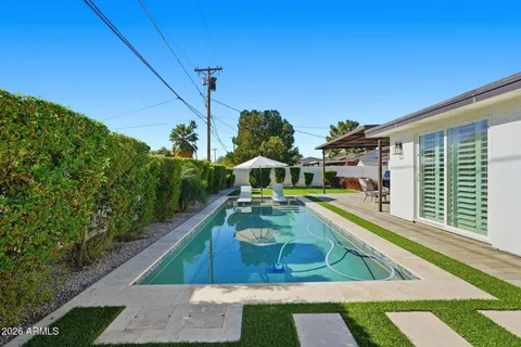 a view of a house with a swimming pool
