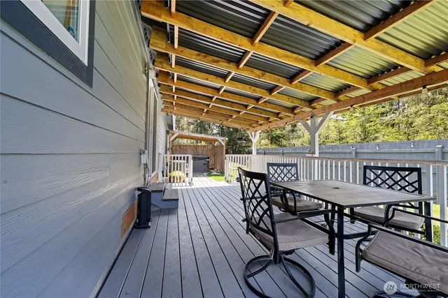 a view of a balcony with chairs