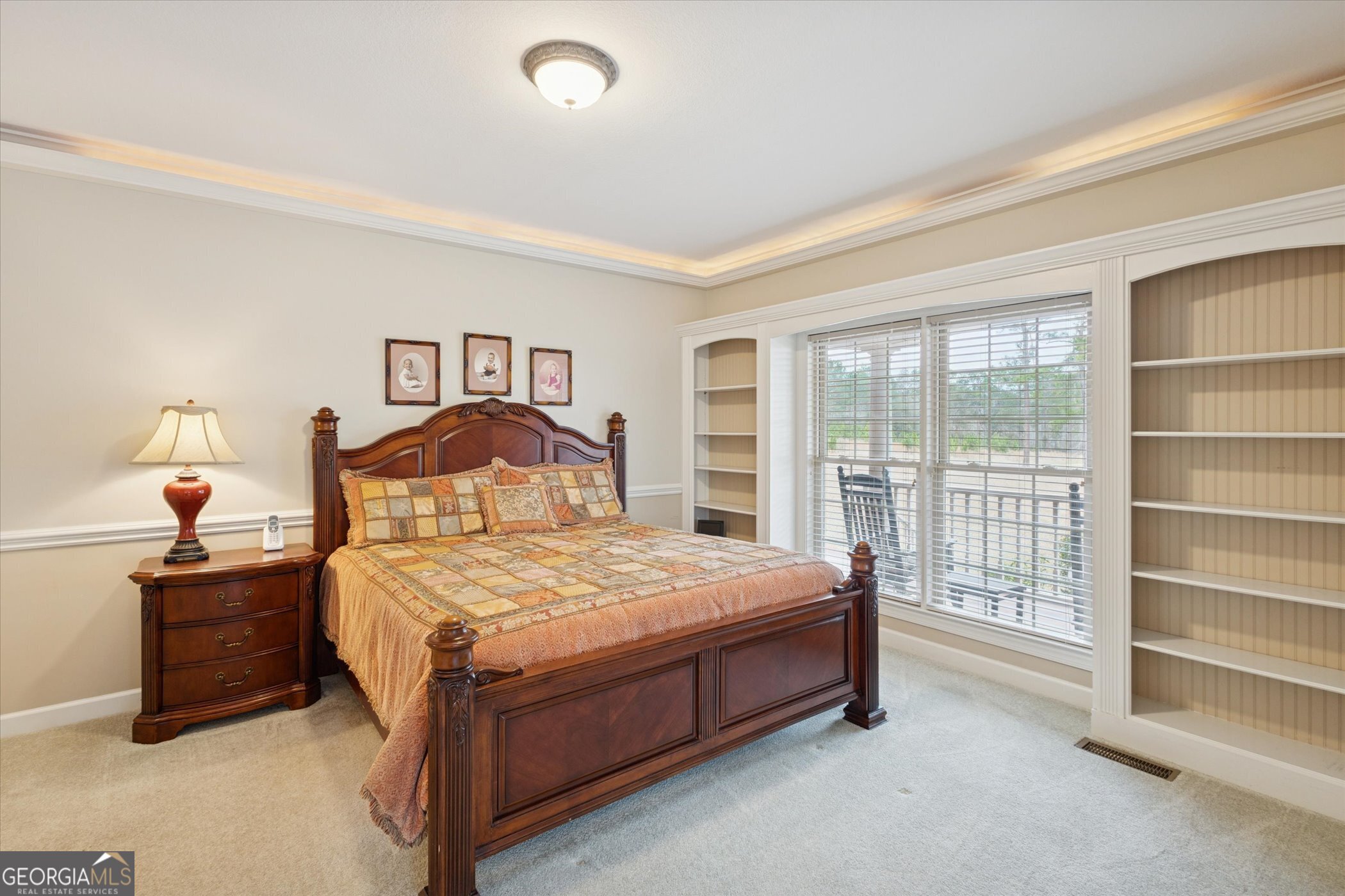 10544 Burkhalter Road Statesboro, GA 30461 - Photo 23 of 67 a bedroom with a bed and a window