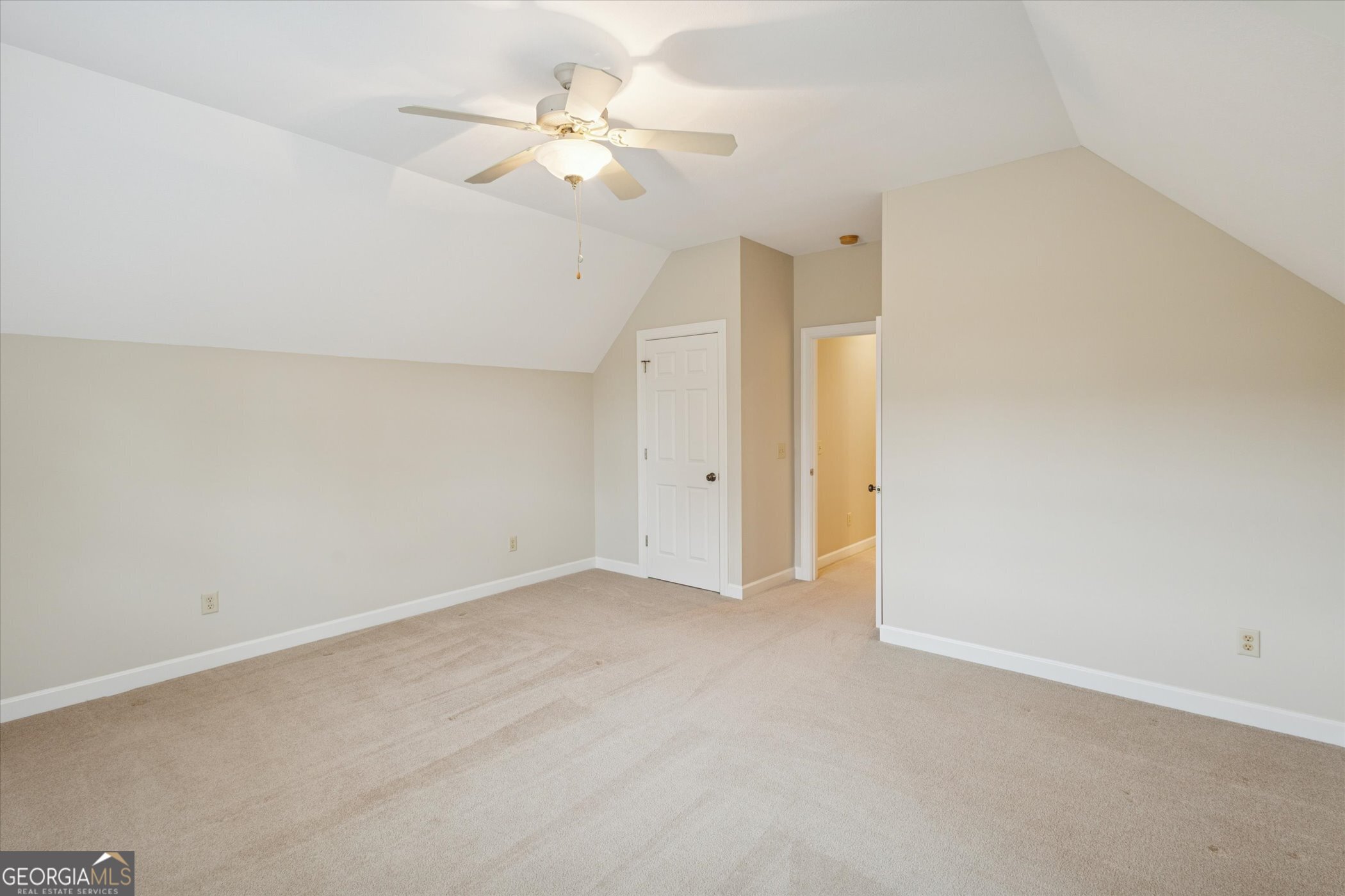 10544 Burkhalter Road Statesboro, GA 30461 - Photo 34 of 67 an empty room with a ceiling fan and a window