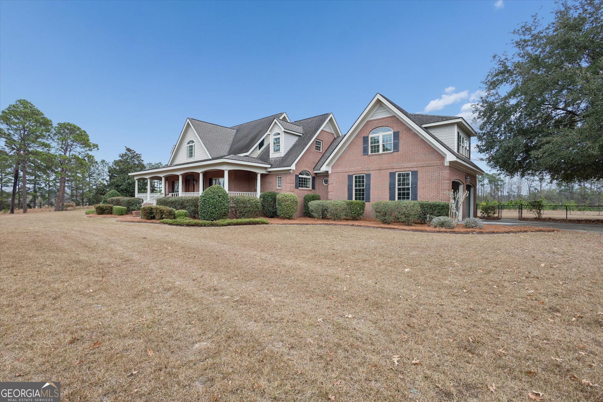 10544 Burkhalter Road Statesboro, GA 30461 - Photo 4 of 67 a view of house with yard and green space