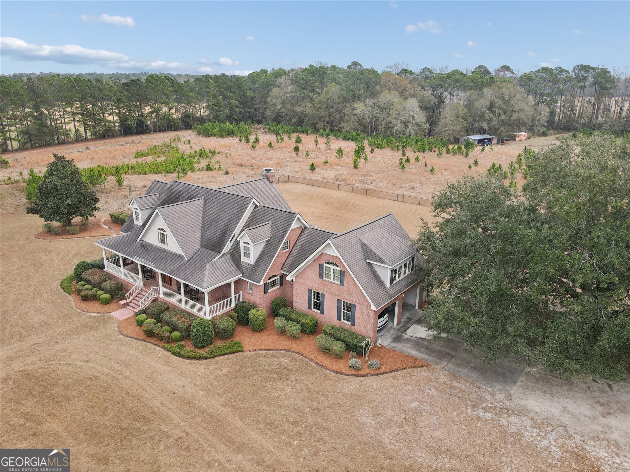 10544 Burkhalter Road Statesboro, GA 30461 - Photo 52 of 67 an aerial view of a house with outdoor space and lake view