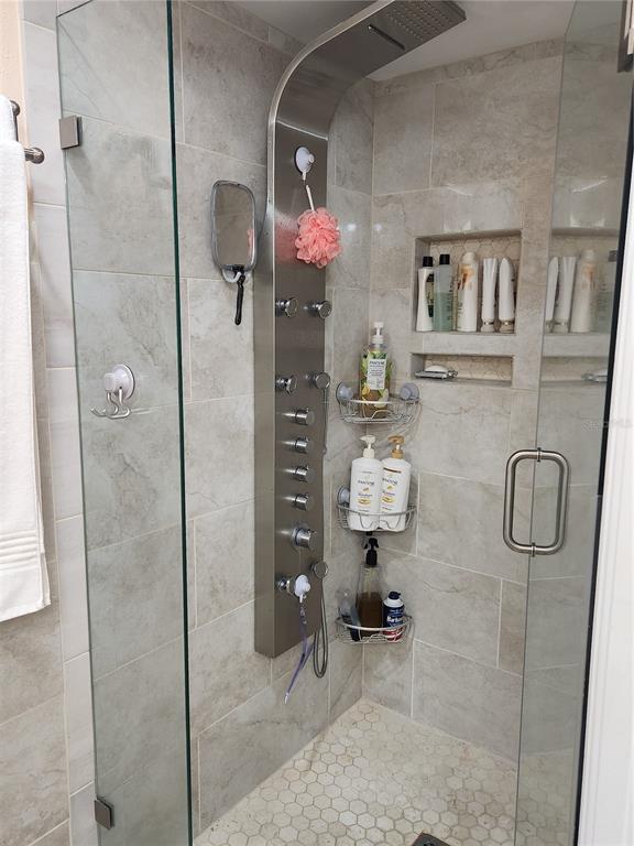 6505 Stone River Road, Unit 304 Bradenton, FL 34203 - Photo 12 of 38 a bathroom with a shower