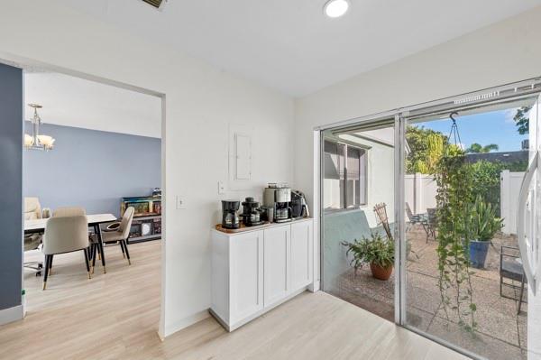 9302 Southwest 5th Street, Unit B Boca Raton, FL 33428 - Photo 14 of 26 a view of a livingroom with furniture and floor to ceiling window