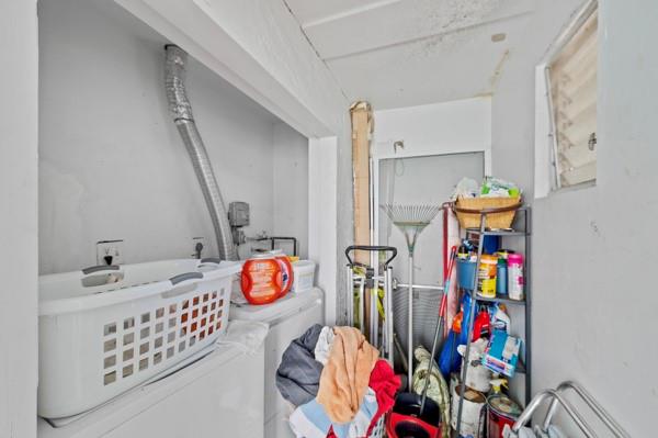 9302 Southwest 5th Street, Unit B Boca Raton, FL 33428 - Photo 23 of 26 a bedroom with furniture and baby toys