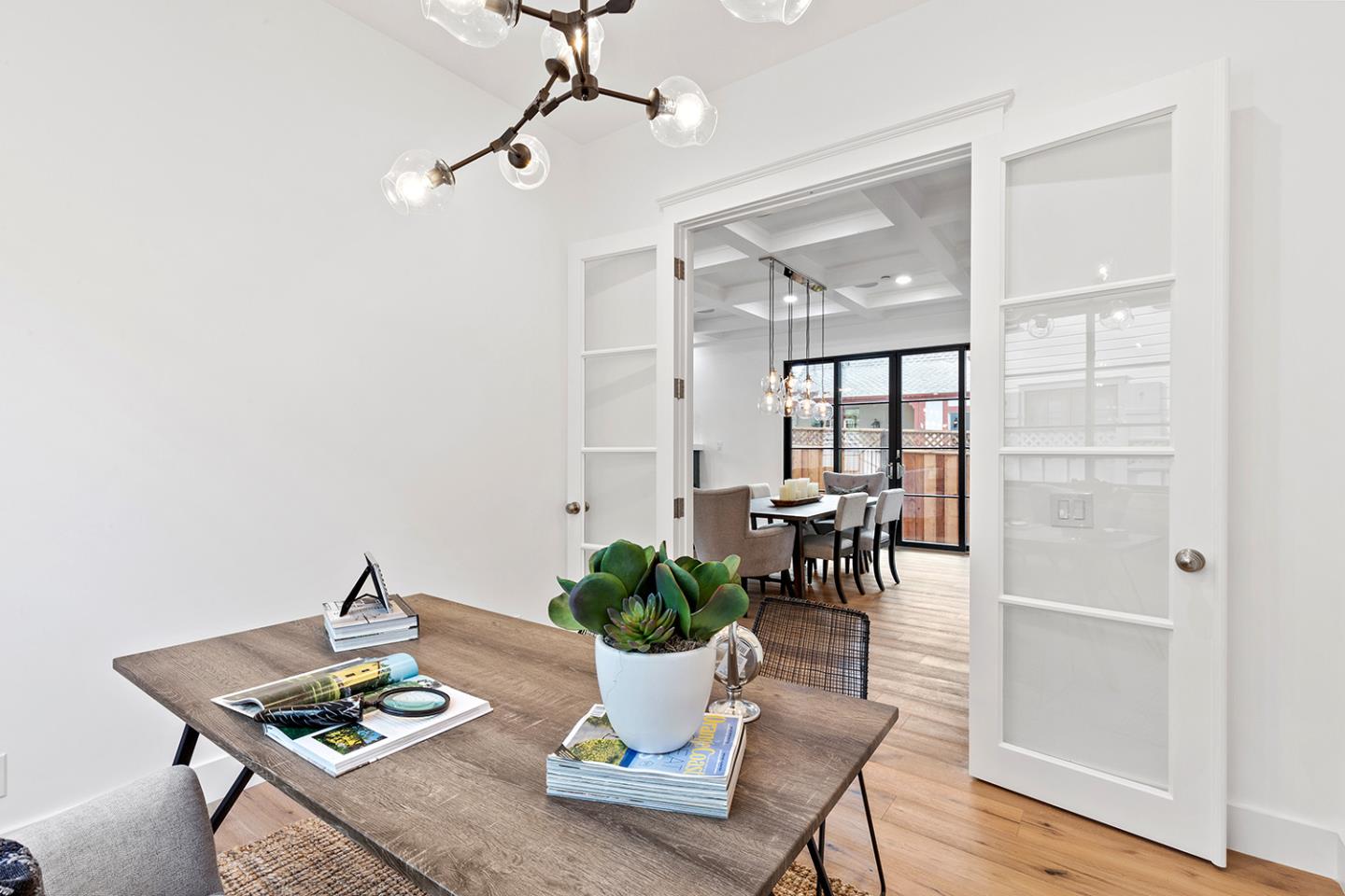 1324 Castillo Avenue Burlingame, CA 94010 - Photo 14 of 50 a living room with furniture and a potted plant