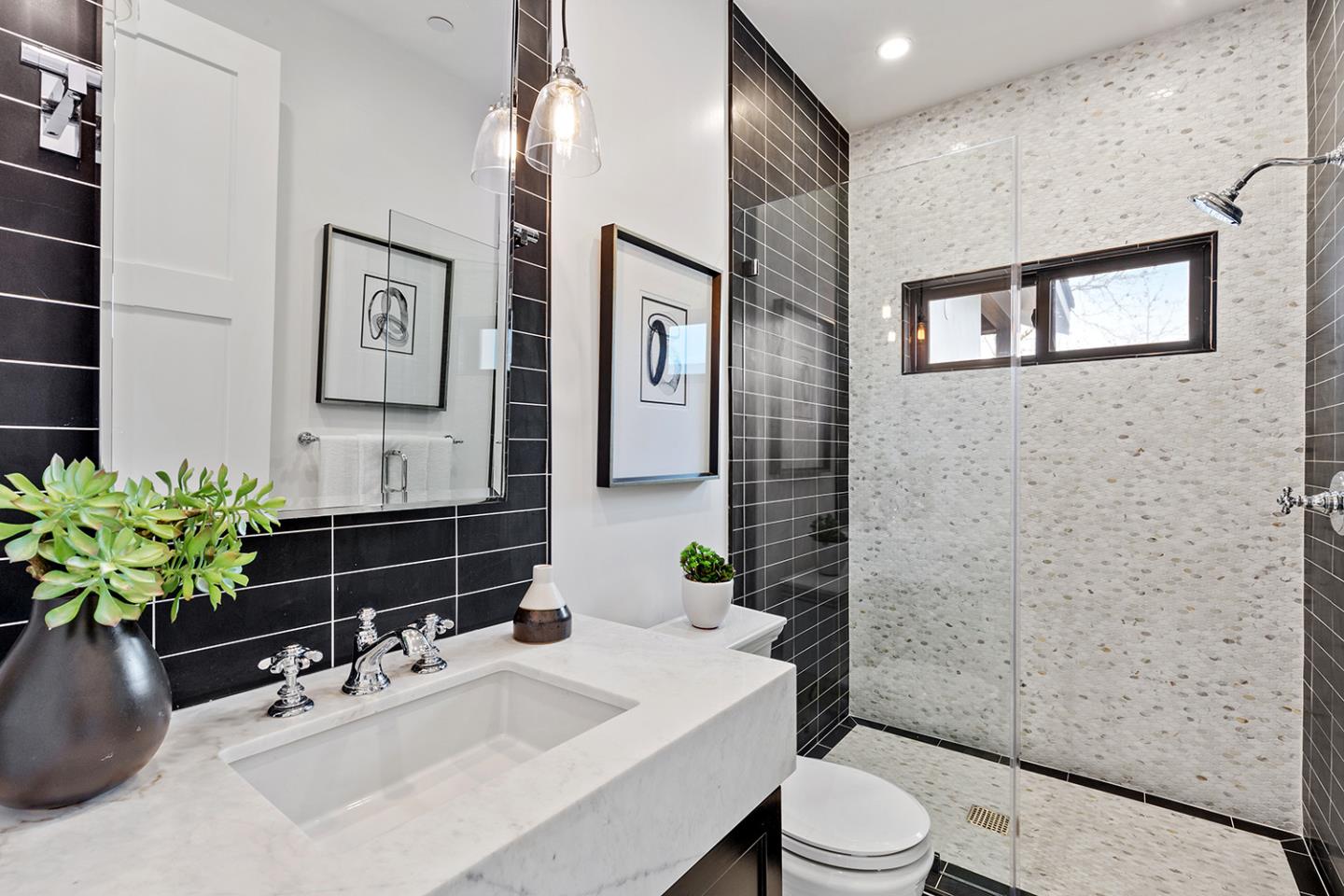 1324 Castillo Avenue Burlingame, CA 94010 - Photo 24 of 50 a bathroom with a sink a toilet and mirror