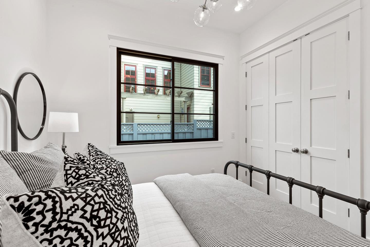 1324 Castillo Avenue Burlingame, CA 94010 - Photo 27 of 50 a bedroom with a bed and a window