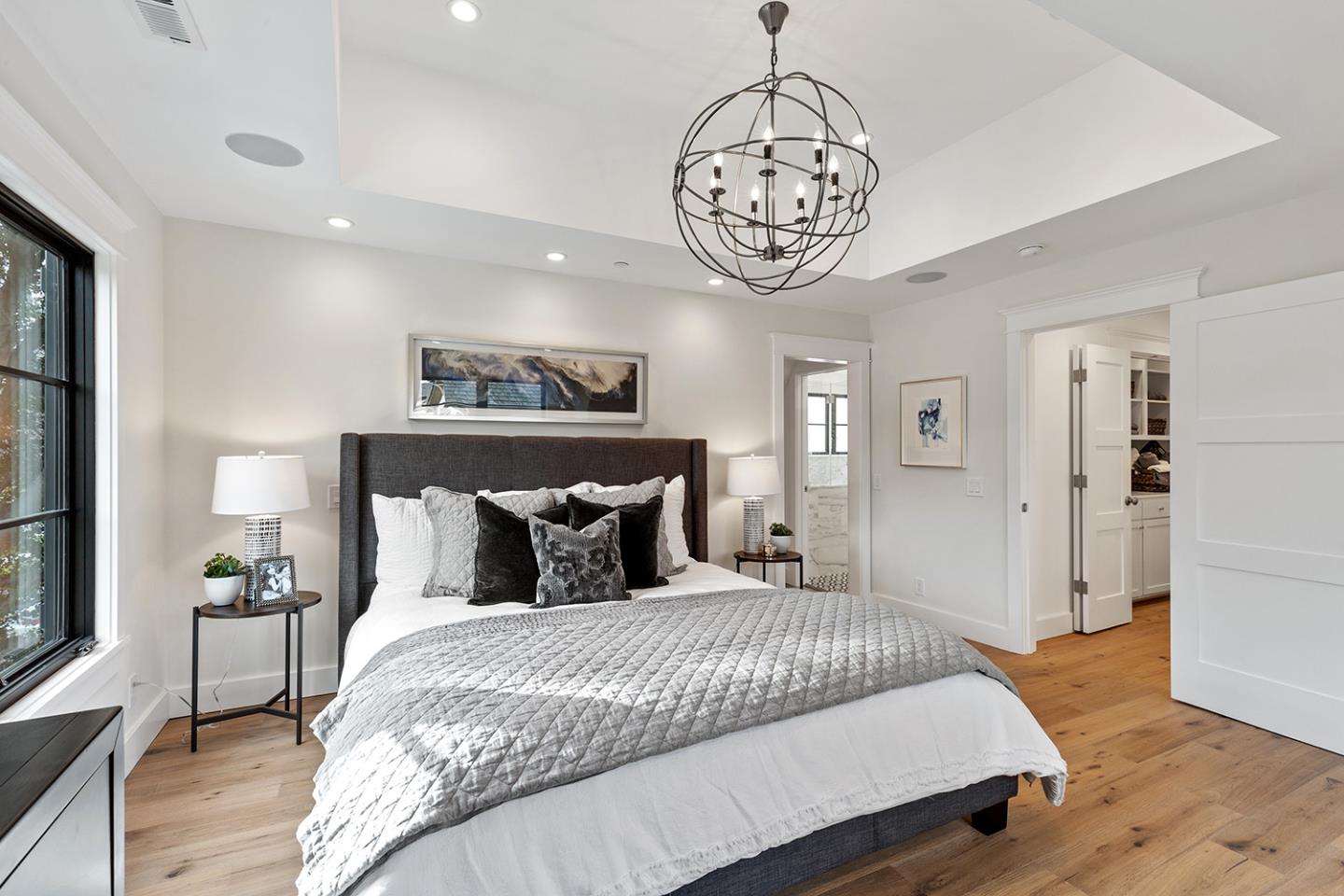 1324 Castillo Avenue Burlingame, CA 94010 - Photo 30 of 50 a bedroom with bed and a chandelier