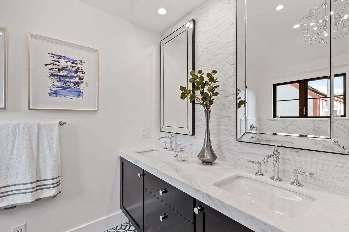 1324 Castillo Avenue Burlingame, CA 94010 - Photo 35 of 50 a bathroom with a double vanity sink and a mirror