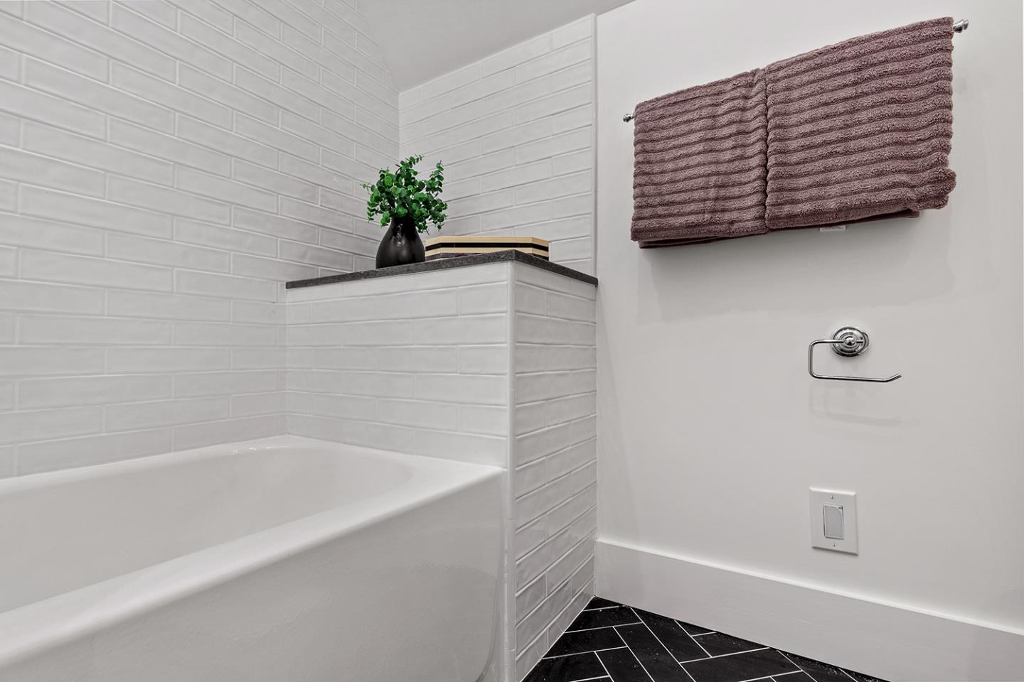 1324 Castillo Avenue Burlingame, CA 94010 - Photo 40 of 50 a bathroom with a shower and a bathtub