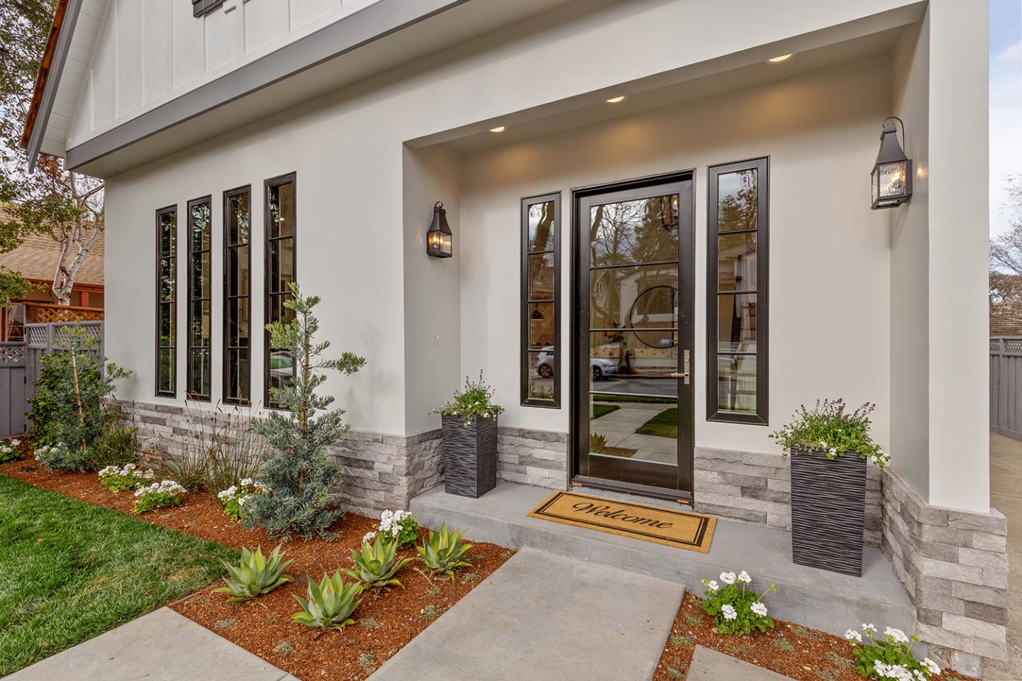 1324 Castillo Avenue Burlingame, CA 94010 - Photo 4 of 50 a front view of a house with garden