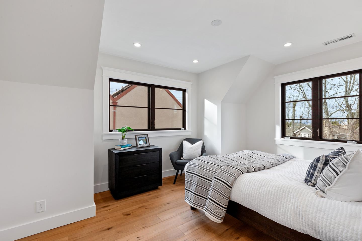 1324 Castillo Avenue Burlingame, CA 94010 - Photo 41 of 50 a bedroom with a bed and a large window