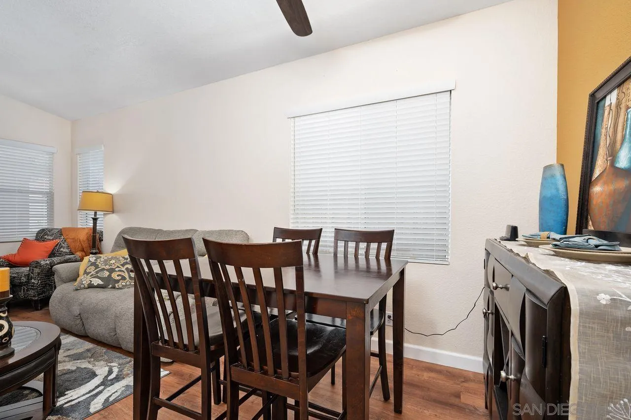 27497 Marian Road Temecula, CA 92591 - Photo 11 of 39 a view of a dining room with furniture and a chandelier