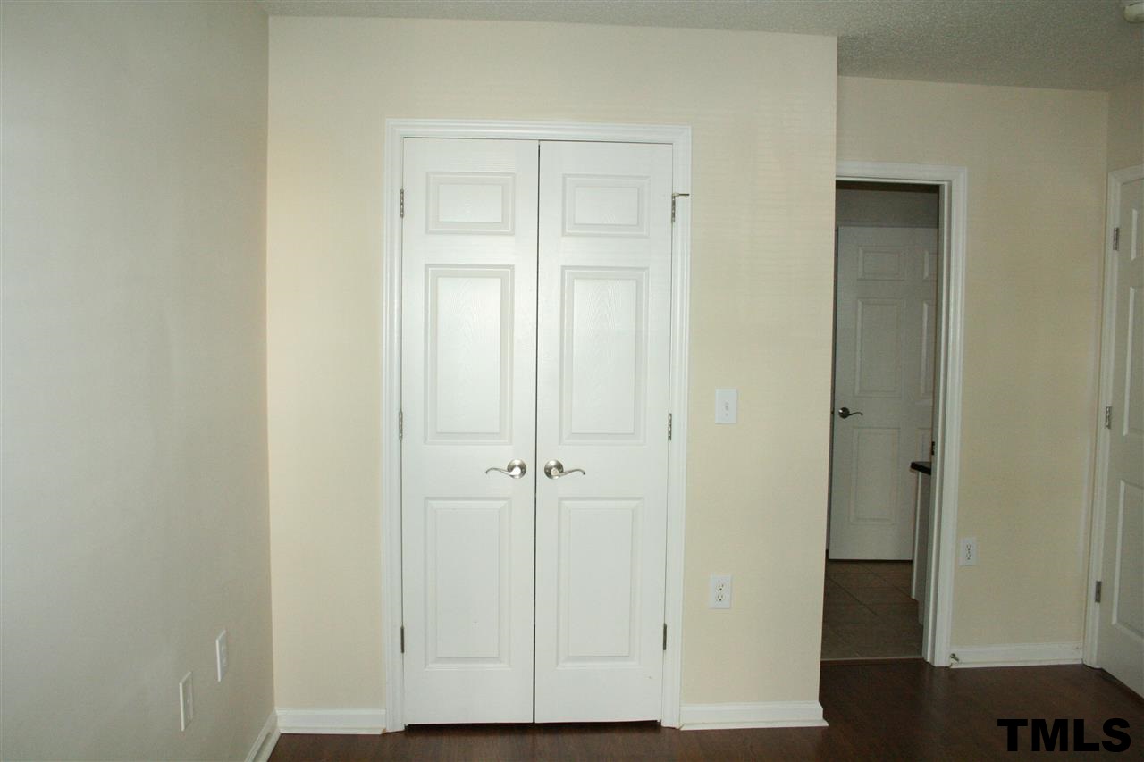 2500 Huntscroft Lane, Unit 101 Raleigh, NC 27617 - Photo 18 of 22 a view of room with hardwood floor