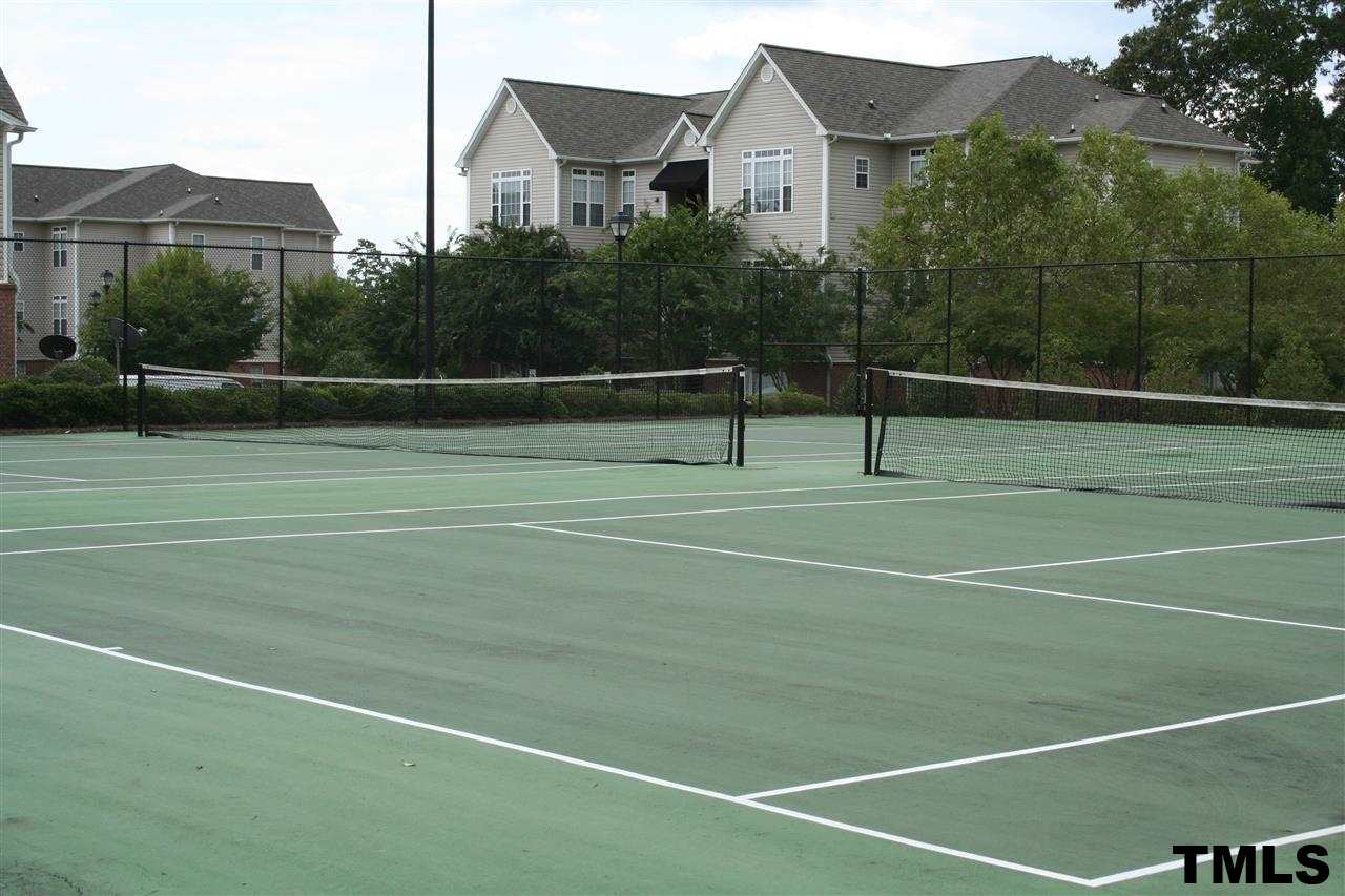 2500 Huntscroft Lane, Unit 101 Raleigh, NC 27617 - Photo 19 of 22 a view of a tennis court