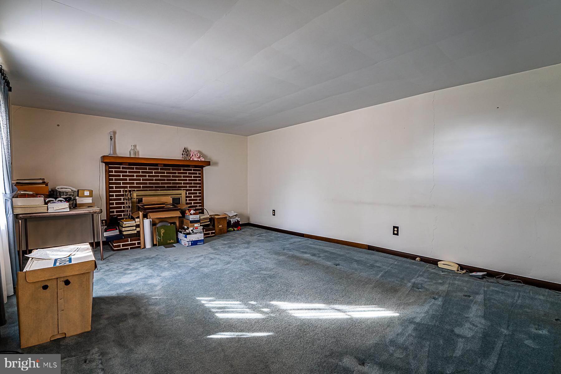 118 Orchard Road Perkasie, PA 18944 - Photo 12 of 34 Living Room Brick Fireplace