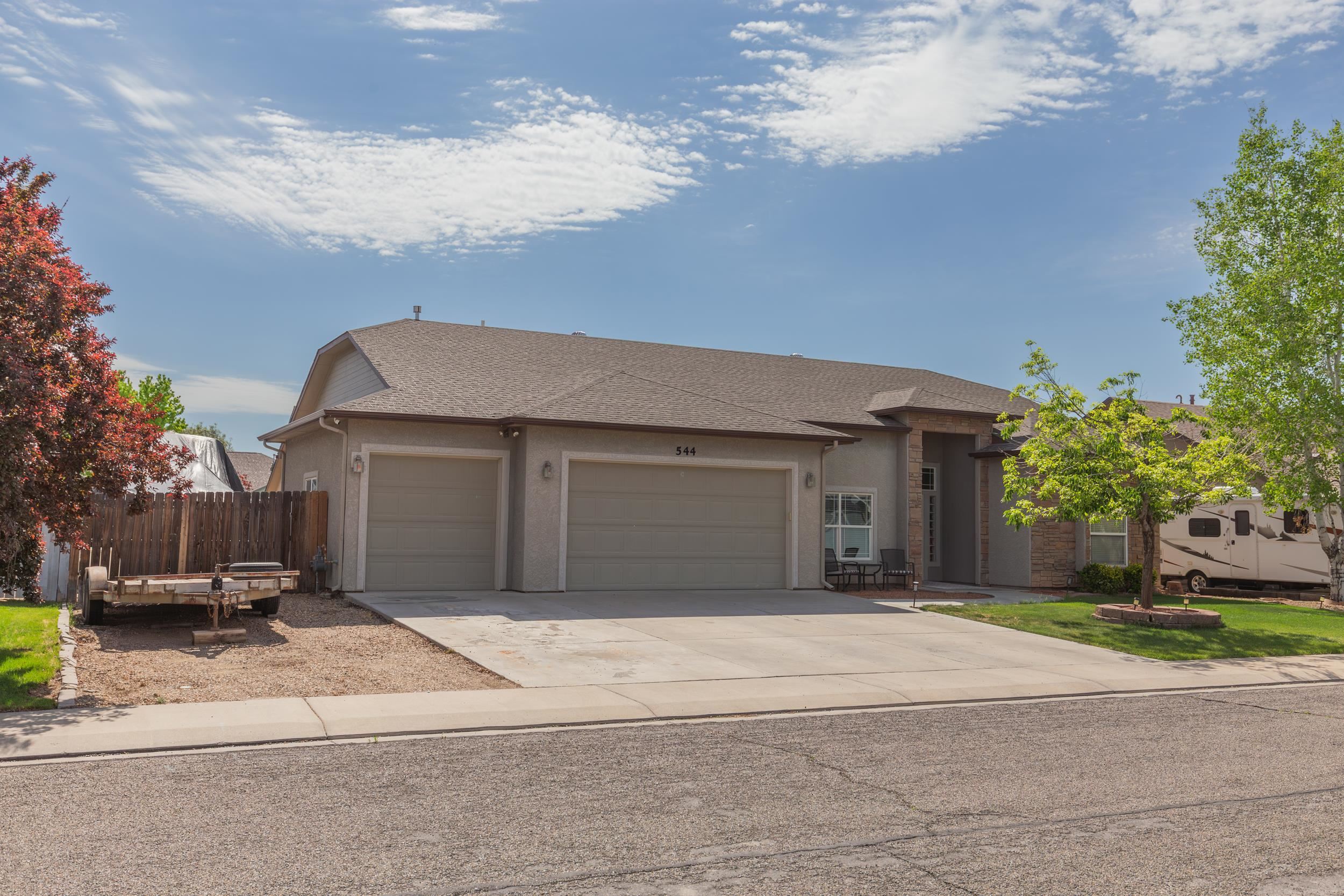 544 Hemlock Drive Fruita, CO 81521 - Photo 2 of 36 a front view of a house