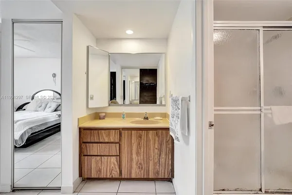 a bathroom with a sink and a mirror