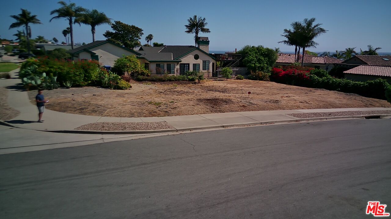 0 Hermosa Drive Pismo Beach, CA 93449 - Photo 4 of 12 a front view of a house with a garden