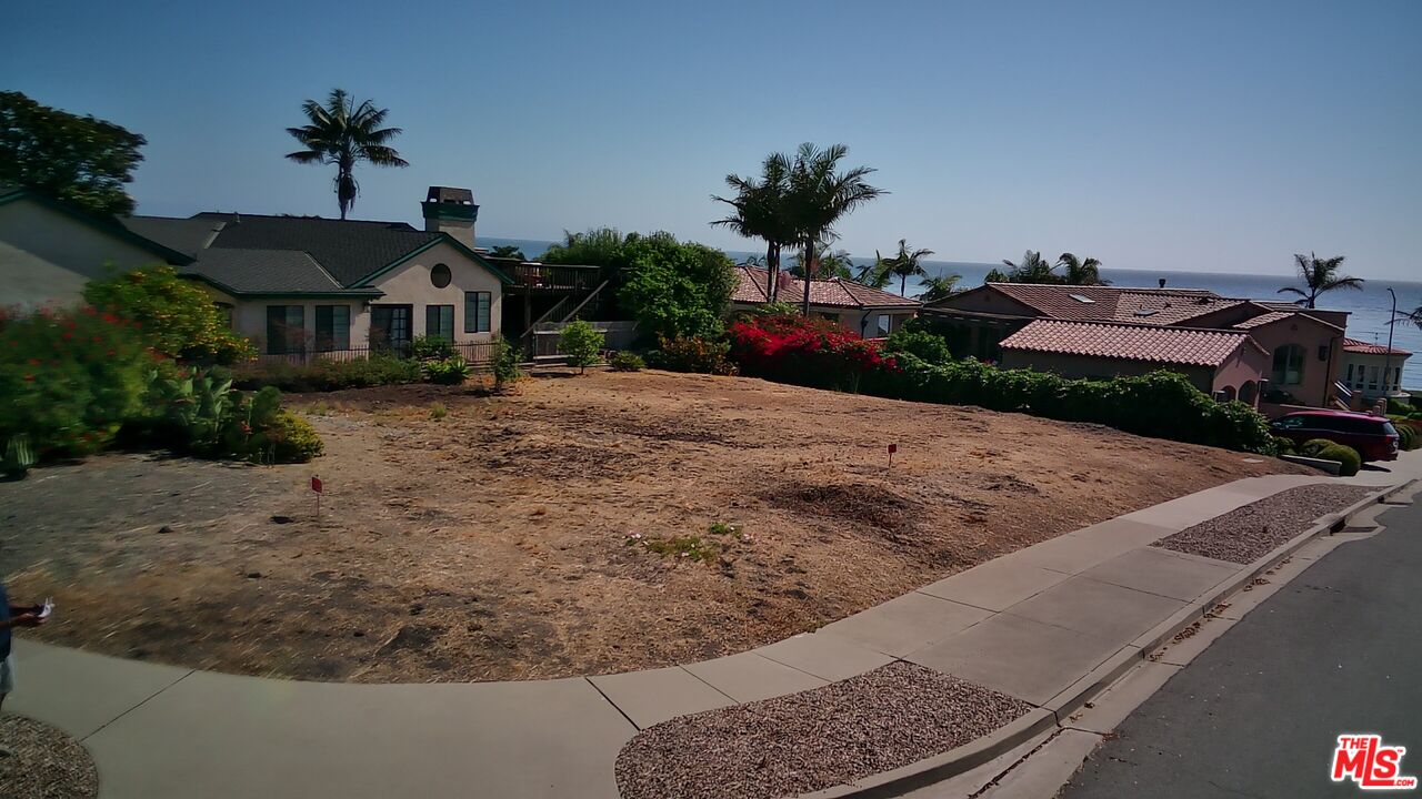 0 Hermosa Drive Pismo Beach, CA 93449 - Photo 5 of 12 a front view of a house with a yard