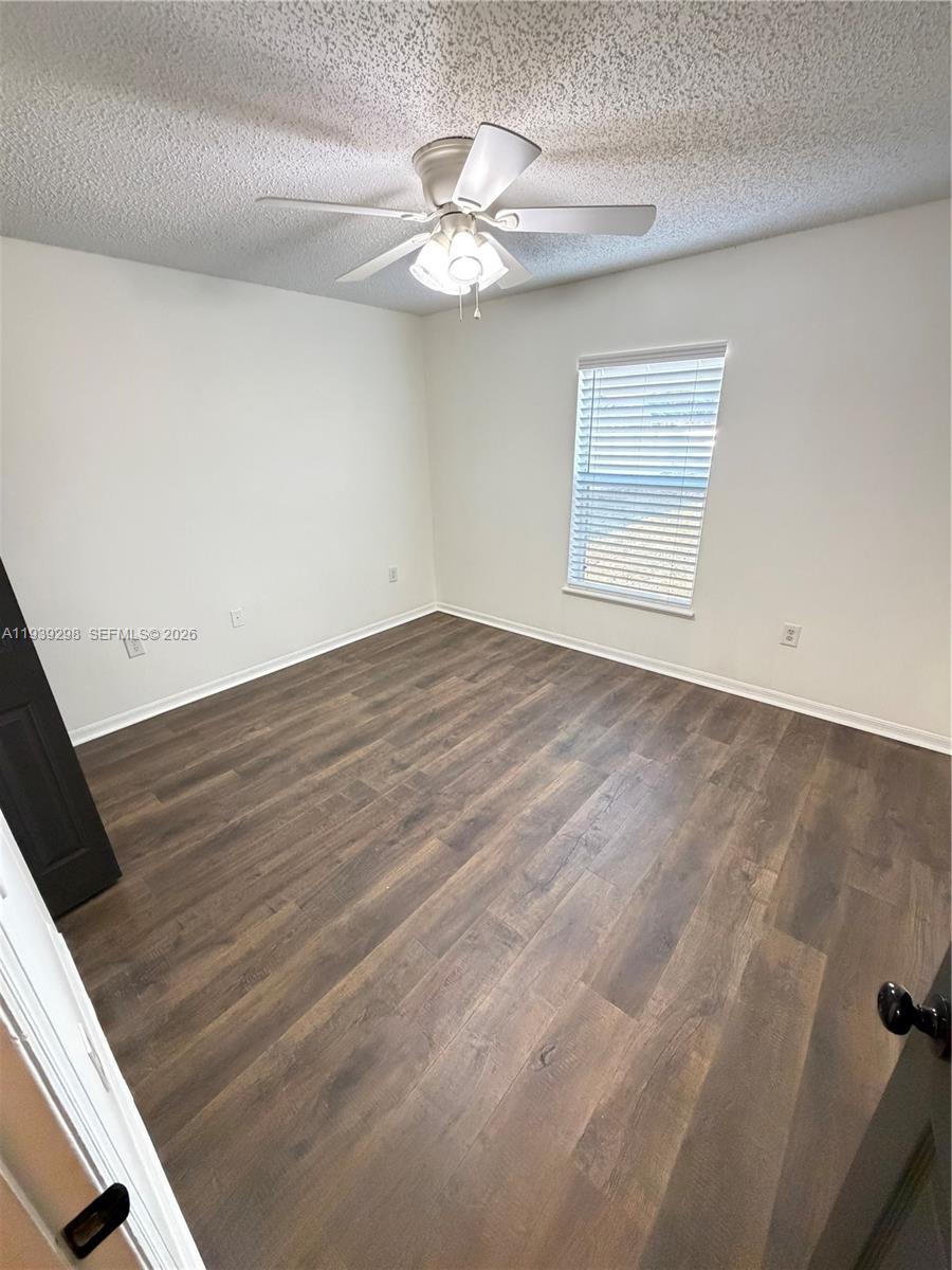7 Zeidler Place Palm Coast, FL 32164 - Photo 16 of 26 a view of an empty room with a chandelier fan
