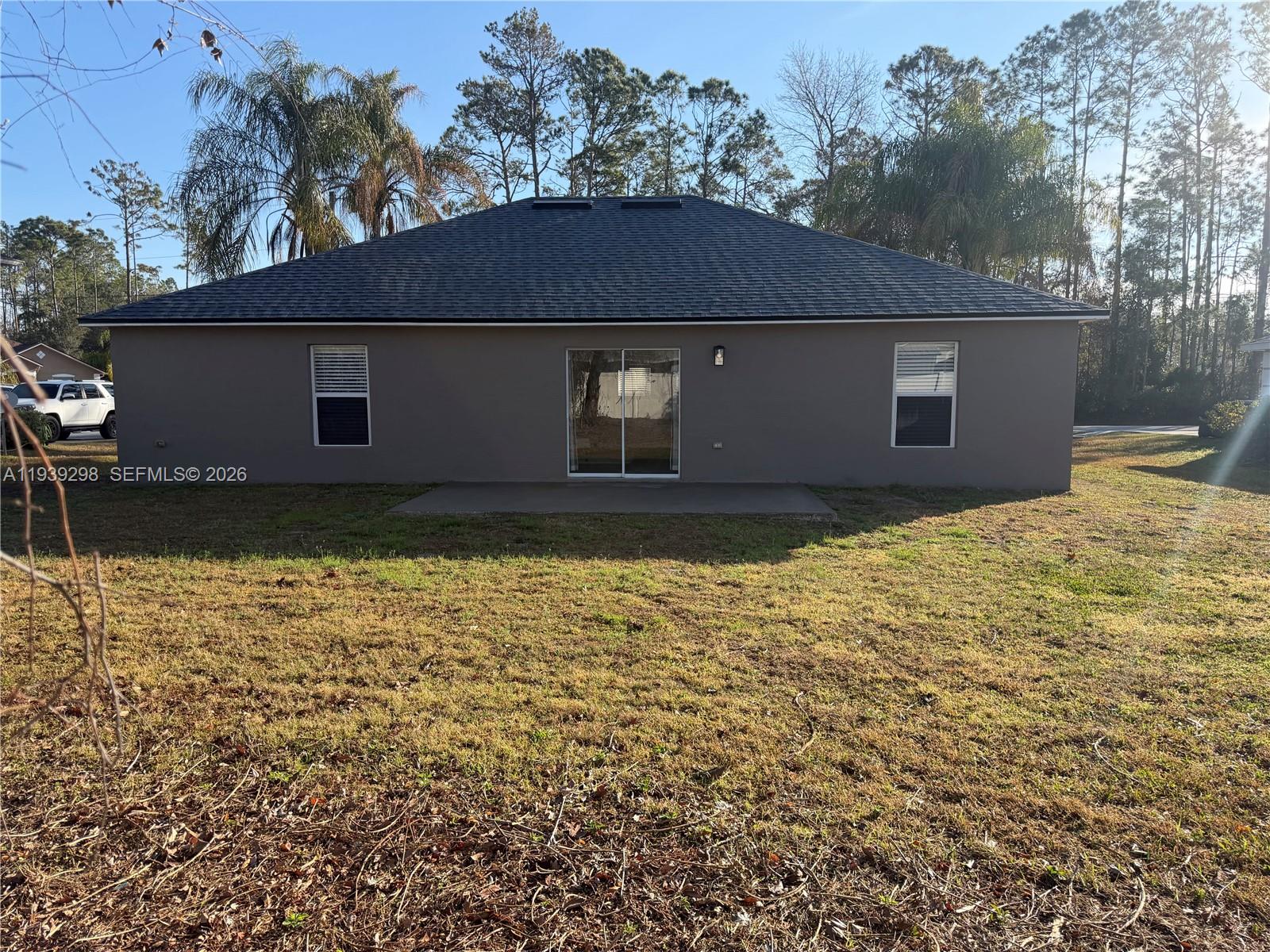 7 Zeidler Place Palm Coast, FL 32164 - Photo 24 of 26 a backyard of a house