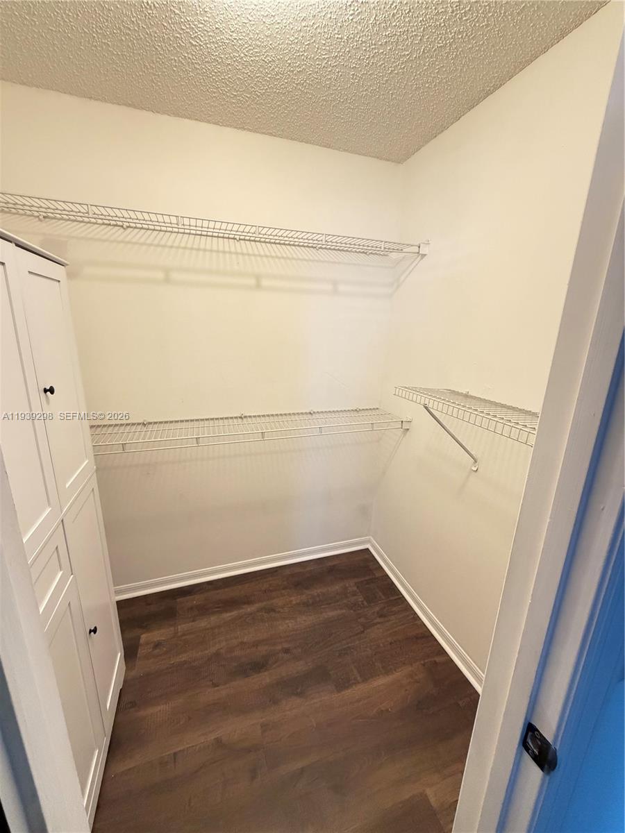 7 Zeidler Place Palm Coast, FL 32164 - Photo 10 of 26 a view of a room with racks on the wall