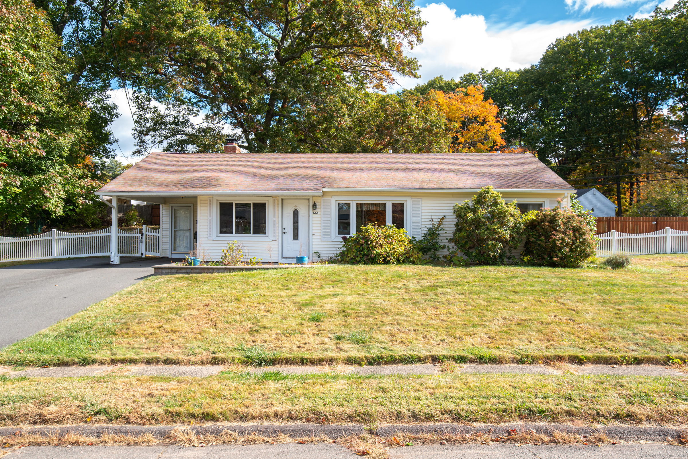 122 Heron Road East Hartford, CT 06118 - Photo 1 of 1 a house that has a swimming pool in front of it