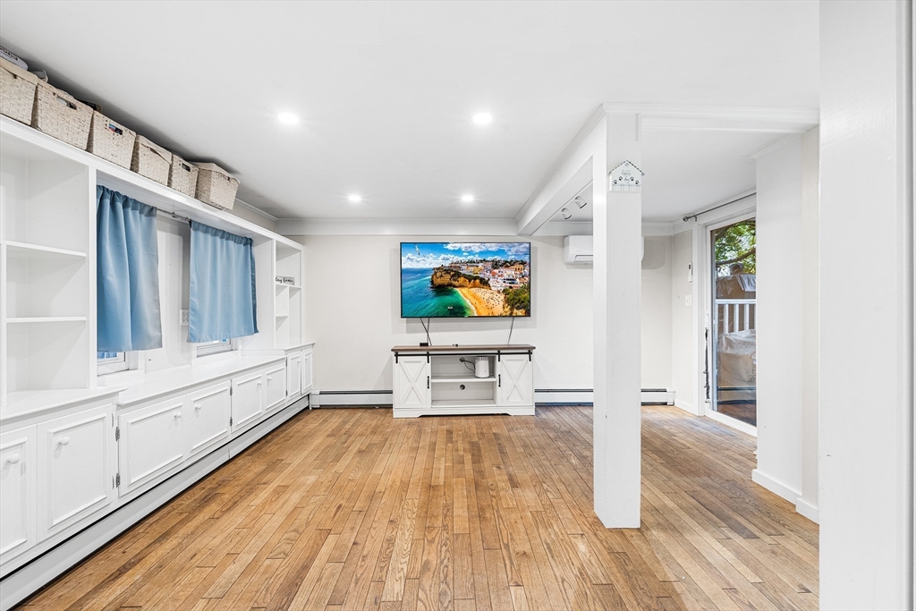 1052 Providence Road Northbridge, MA 01588 - Photo 12 of 42 a living room with furniture and a flat screen tv
