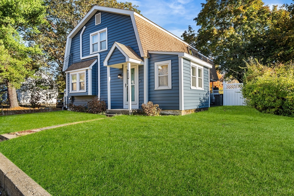 1052 Providence Road Northbridge, MA 01588 - Photo 2 of 42 a front view of a house with a garden